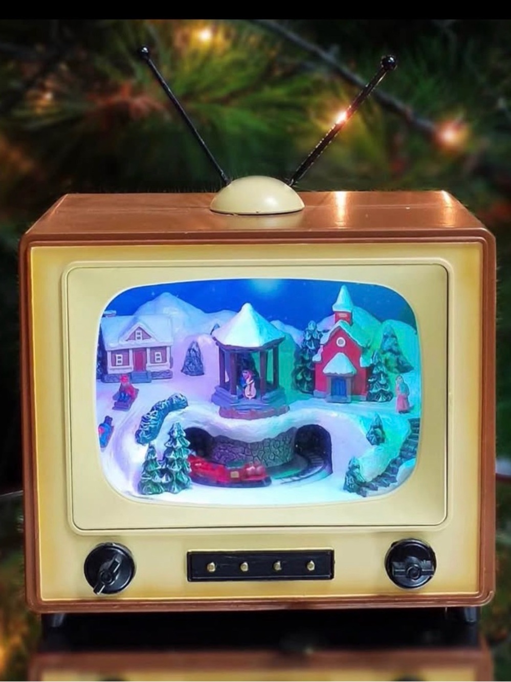 Retro TV animated train that plays Christmas music and lights up